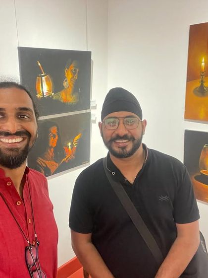 With a friend and fellow artist at the exhibition.