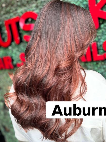 A close-up of the Auburn shade. It's a sophisticated red that's both eye-catching and elegant.
