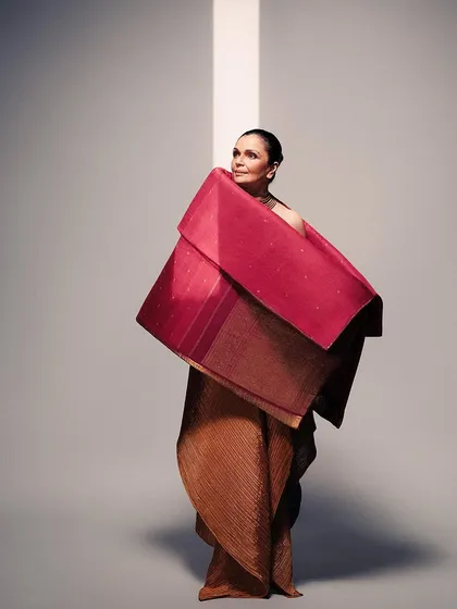 Here, I explored creating new forms by draping a traditional Kanjeevaram saree over classic Issey Miyake pleats. It’s a dialogue between different cultures and textures, resulting in a wearable sculpture.