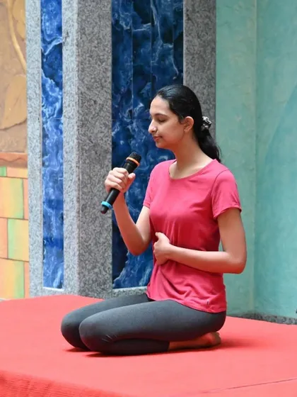 During a workshop, I guide participants through abdominal breathing while in Vajrasana. This is a foundational technique for stress reduction that anyone can learn and practice at their desk.