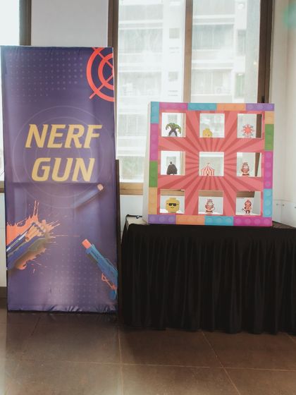 Ready, aim, fire! A Nerf gun shooting gallery where kids can test their aim by knocking down targets. This is a safe and exciting game for an action-themed party.