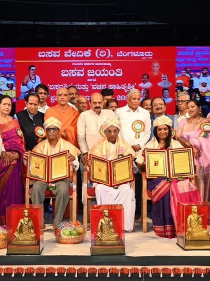 On stage with fellow awardees at the Basava Jayanti event. It was my good fortune to share the stage with senior artist Goru Channabasappa.