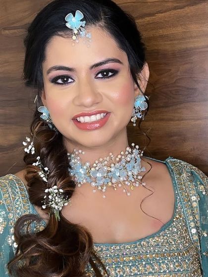 Another look at the popular light blue floral set, paired here with a different outfit to show its versatility for pre-wedding parties.