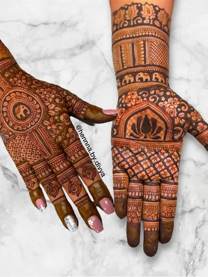 A beautiful asymmetrical design combining an elephant mandala on one hand with a lotus and grid pattern on the other. The contrast creates a modern and artistic look.