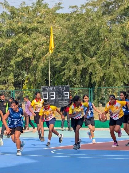 Another dynamic shot of the Mumbai University team on a fast break. My coaching emphasizes quick transitions and disciplined offense, which you can see in action here.