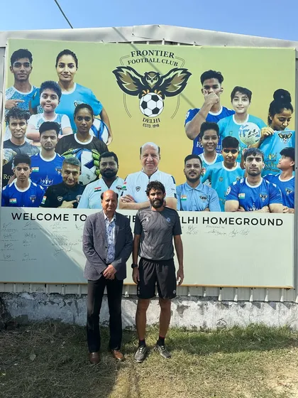 Our management with a member of the Jamshedpur FC team. Hosting professional clubs is part of our commitment to player development.