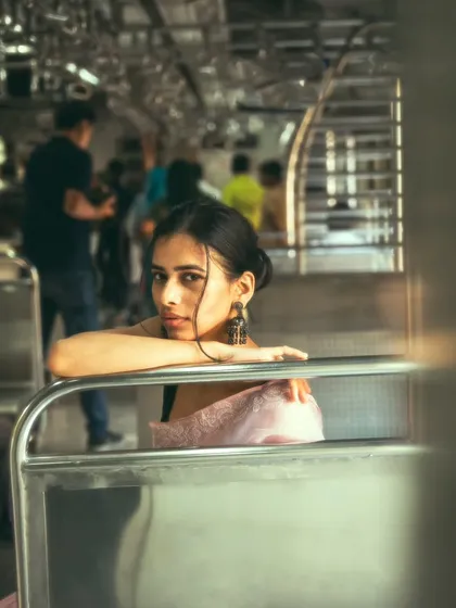 For me, this is the real Mumbai. Capturing a quiet, candid moment amidst the constant motion of a local train is what my photography is all about. It’s about finding stillness in the chaos.