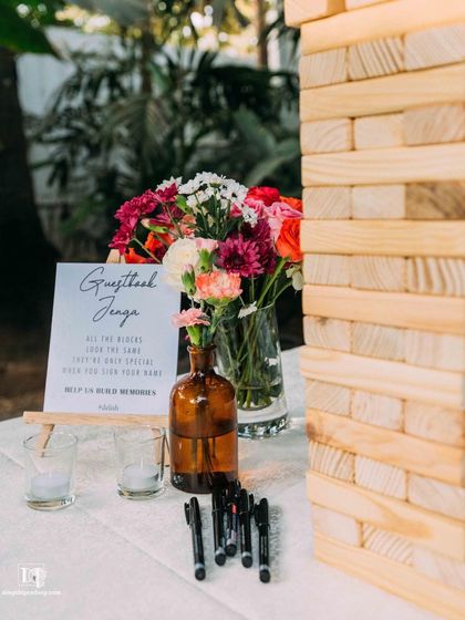 The perfect setting for a pre-wedding cocktail party or sangeet night. The lawn provides ample space for a dance floor, while the surrounding trees, lit with elegant chandeliers and string lights, create a festive and celebratory atmosphere.