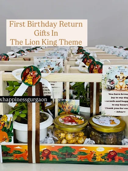 This shot of the 'Lion King' return gifts highlights the personalized thank you card and the custom-printed basket design.