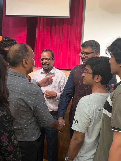 Interacting with students and faculty after my talk at IIT Madras. These informal conversations are often where the most candid exchanges happen.