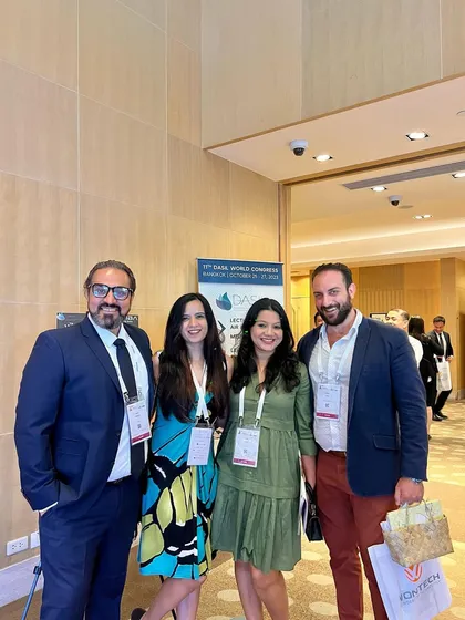 With friends and colleagues in the halls of the DASIL World Congress in Bangkok.
