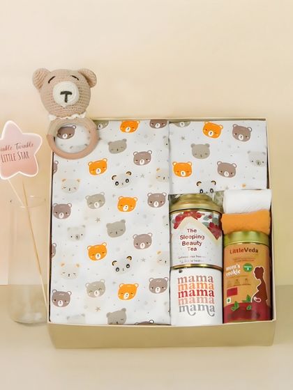 A gift box for a new mom and baby, including tea for the mother and a rattle for the baby. This shows my ability to photograph hampers with a dual purpose.