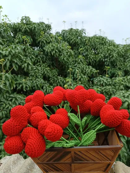 A final shot of the beautiful basket of red heart flowers.