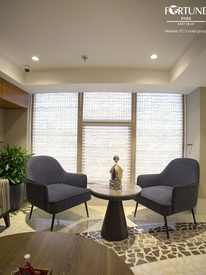 My spa lounge offers a quiet corner for conversation or contemplation. The natural light and comfortable seating make it an ideal space to transition into or out of your state of relaxation.