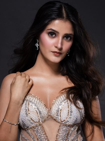 A portrait of a pageant contestant in a heavily embellished, modern take on a bridal gown. This showcases my ability to shoot high-glamour, pageant-ready looks.