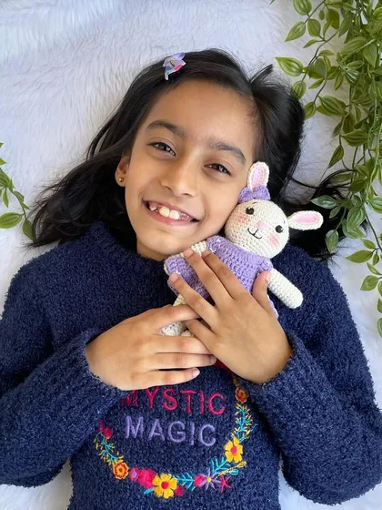 A lovely bunny in a purple dress with a custom initial "Q" on it. I made a similar one for my own daughter's birthday, and she absolutely adores it!
