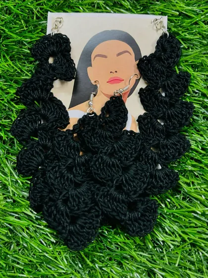 For a bolder look, I created these black floral-inspired crochet earrings. The intricate, open-work design makes them a unique piece of statement jewelry.