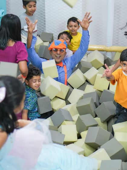 Blippi having a blast in the foam pit with the kids. These interactive moments with characters make our parties truly special.