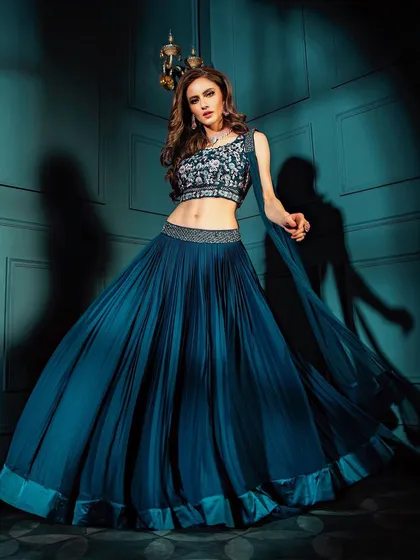 This full-length shot from a bridal lehenga lookbook demonstrates my approach to e-commerce and catalogue photography. The lighting is designed to show the true color and flow of the fabric, while the pose highlights the entire silhouette of the garment.
