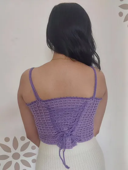 The back of the Aurelia Top features a corset-style lacing for an adjustable and perfectly snug fit.