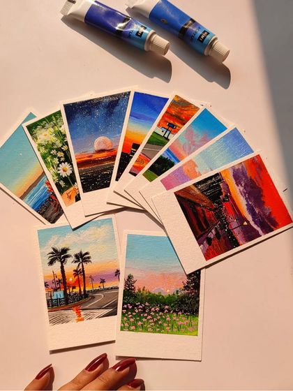 Fanning out a set of my commissioned polaroid paintings. It's so satisfying to see them all together before they go to their new homes.