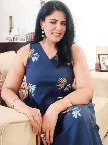 For a special evening out, I wore this long, comfy cotton dress in a beautiful shade of blue with gold and teal floral prints. I chose gold earrings to complement the gold hues in the dress.