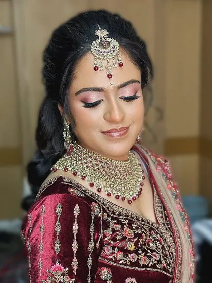 An eyes-closed shot to showcase the blended eyeshadow and flawless base.