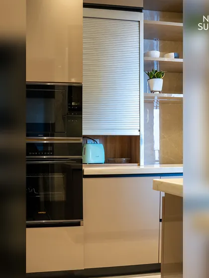 A close-up of the appliance garage with its convenient roller shutter. This feature is a prime example of our focus on practical design, providing easy access to everyday items while maintaining a clean and organized look.