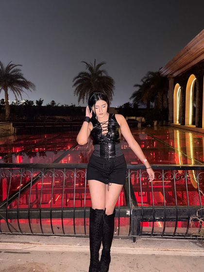 A full-length shot of the spooky season outfit.