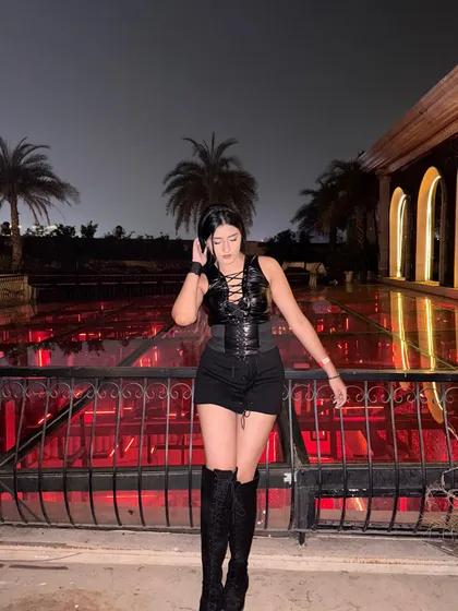 A full-length shot of the spooky season outfit.