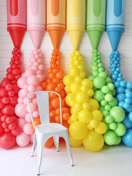 Another view of our popular crayon-themed balloon wall. It provides a vibrant and fun setting that encourages guests to take pictures and make memories.