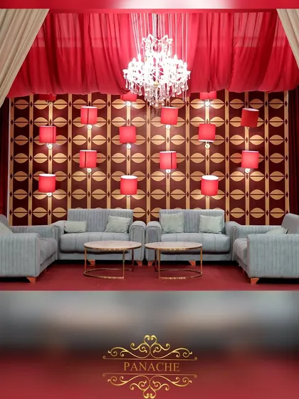 A full view of the after-party stage and lounge, a perfect blend of bold color and modern design.