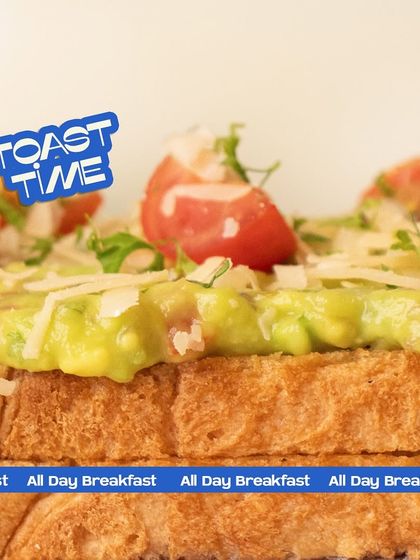 It's always toast time here. This is my signature avocado on toast, with creamy guacamole, fresh cherry tomatoes, and a generous shaving of parmesan cheese.