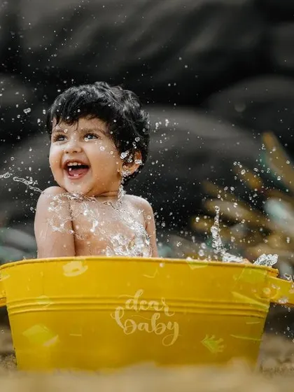 The purest joy is found in a splash. We capture these candid moments of laughter and fun, whether in our studio or outdoors, for memories that feel real and full of life.