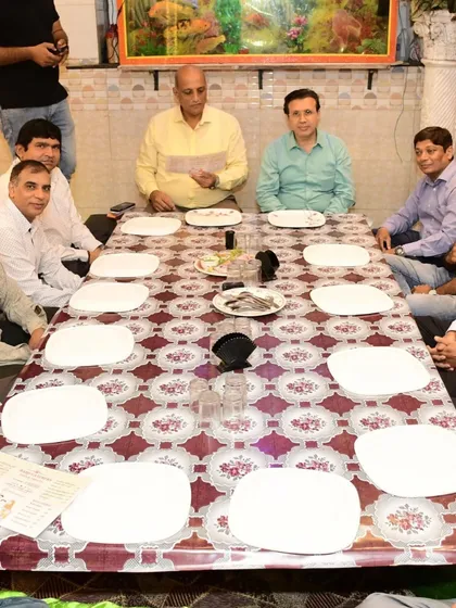 A Dastarkhwan setup ready for guests to arrive. I ensure everything is perfectly arranged before you sit down for your meal.