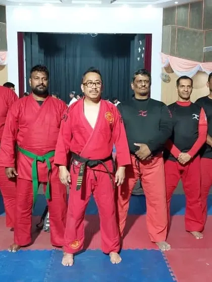 Our team in our red uniforms after a demonstration at the UWMAF World Cup. We showcased Shinkali, Krav Maga, and our unique blend of martial arts.