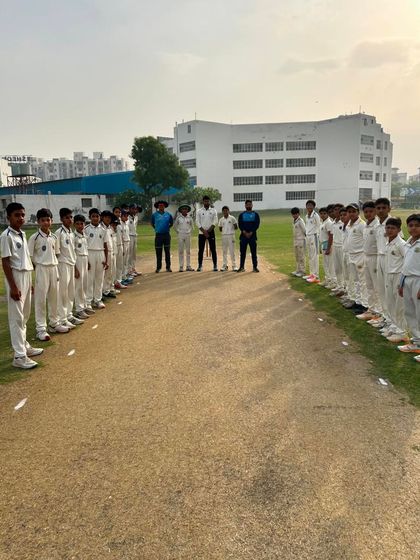 The two teams lined up before a competitive match. This picture represents the spirit of sportsmanship we instill in our players.