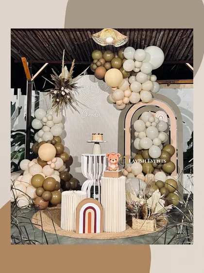 For a softer, trendy vibe, my boho teddy bear setups are a huge hit. I use a palette of earthy browns, creams, and greens with natural elements like pampas grass to create a warm and stylish party atmosphere.