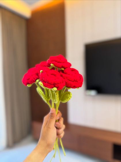 A handful of our single-stem red roses. You can buy these individually to create your own custom bouquet or use them as small decorative accents.