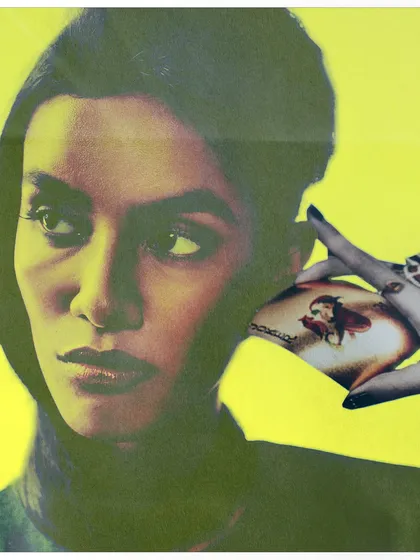 A high-contrast portrait with a yellow overlay, where a small, collaged image is placed near the model's ear. This shot explores the subtle ways media imagery becomes part of our identity.