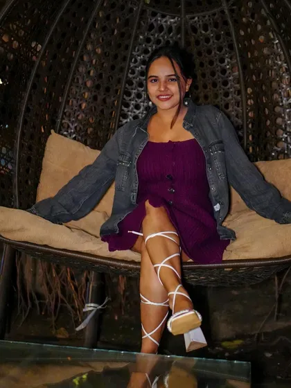 A guest relaxing in a cool chair at Pebble before the party starts.