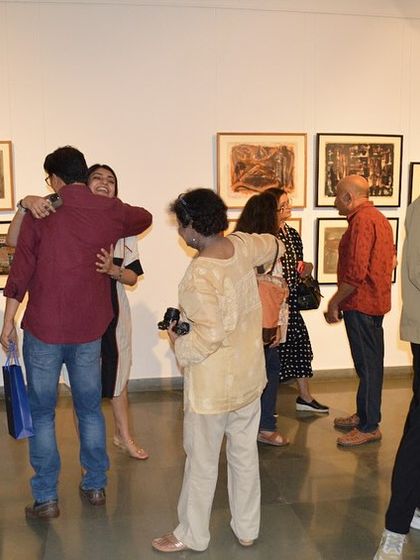 Guests mingling and celebrating the artist at the preview.