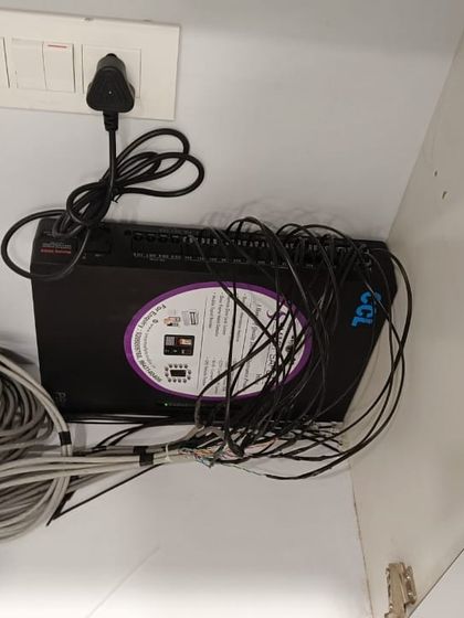 This is the heart of the intercom system: the EPABX main unit with all the extension lines connected. I ensure the wiring is organized and easy to manage.