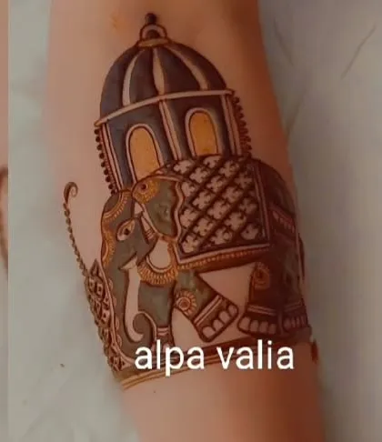 A royal design featuring an elephant inside a palace dome. This is a unique and majestic motif for a bridal armlet.