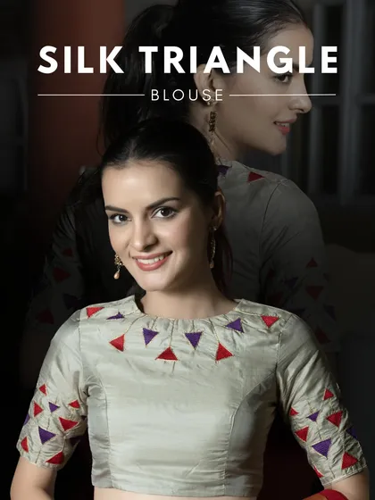 This pure silk blouse is a must-have to elevate any traditional wardrobe. Its rich texture, luxurious sheen, and elegant fit add a touch of grace, pairing beautifully with Kanjeevaram or Banarasi sarees.