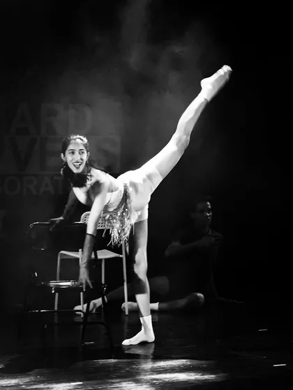 A classic "All That Jazz" moment. The high kick, the smile, the stage lights. This is what our jazz students work towards.