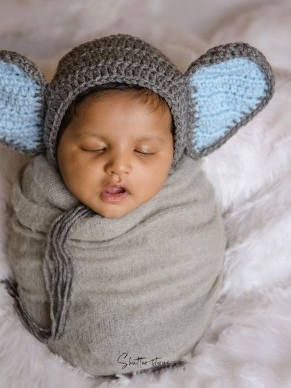 A sleepy moment from our tiny elephant, all wrapped up and cozy.