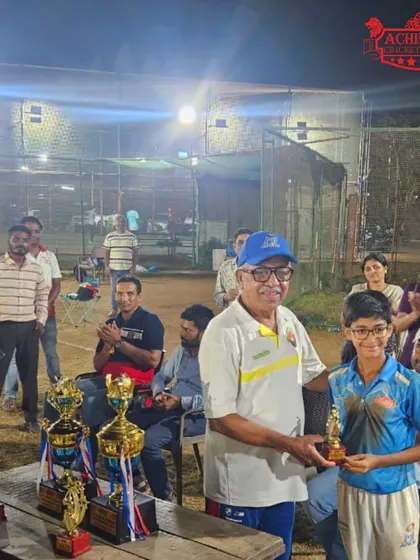 A proud moment as Shaunak Gawade receives one of his many awards at the U-11 night tournament.