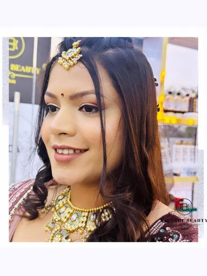 A close-up of this beautiful, natural-looking party makeup. The focus is on flawless skin and softly defined eyes, perfect for any occasion.