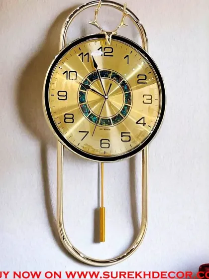 This imported wall clock features a fully golden face with a textured center, creating a look of pure luxury. The design is both a functional timepiece and a radiant piece of wall decor that adds warmth and glamour to your room.
